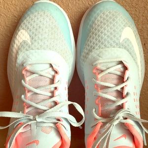 Ladies NIKE athletic shoes. Light blue color
